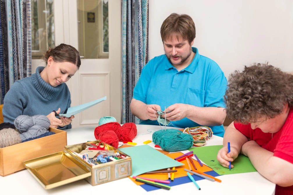 Disabled friends in art class